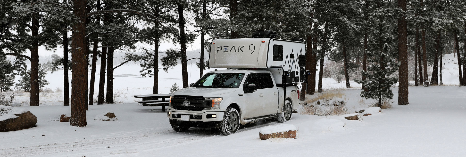 Truck camper in the snow